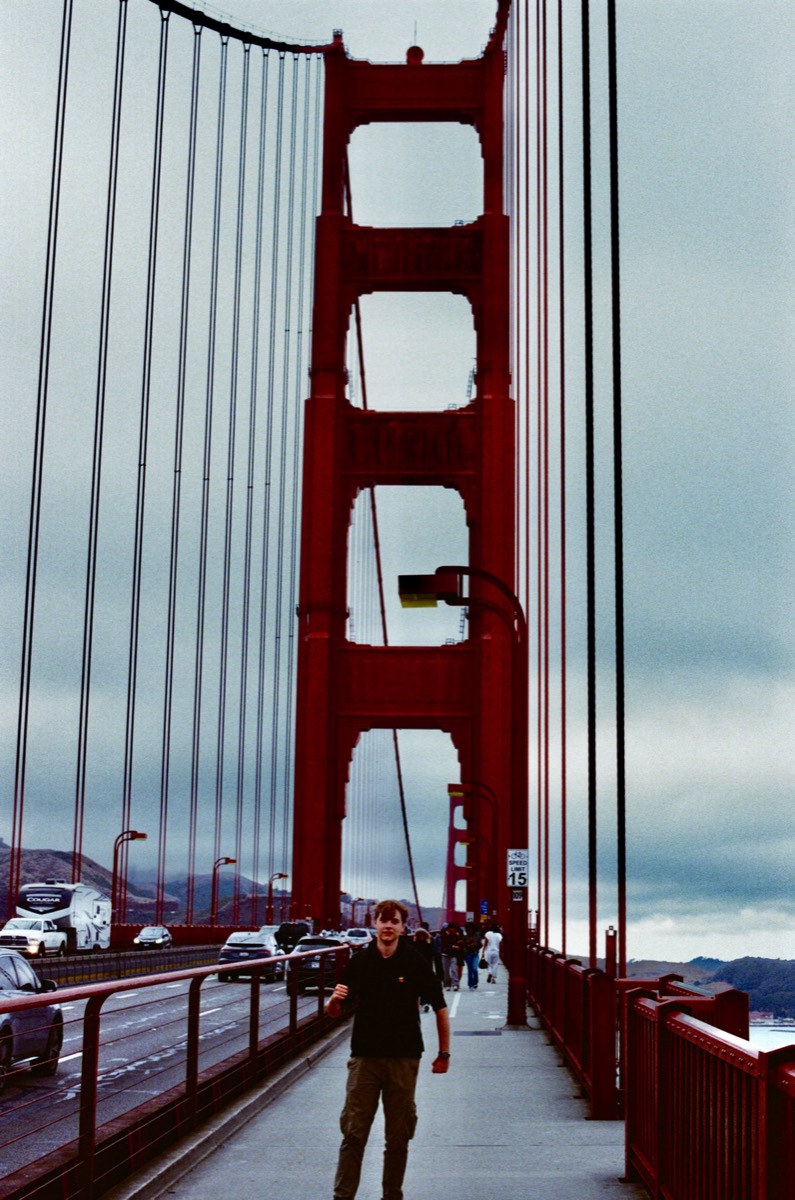 Ali walking on the bridge